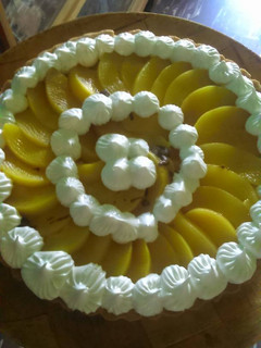 Una foto de Tarta de durazno con crema pastelera