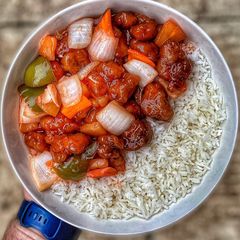 A picture of Sweet & Sour Pork w/ Rice.