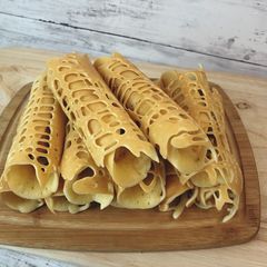 A picture of 👩🏽‍🍳🧑🏼‍🍳Khanom Tokyo with Minced Pork & Sausage• Thai Street Snack |ThaiChef Food.