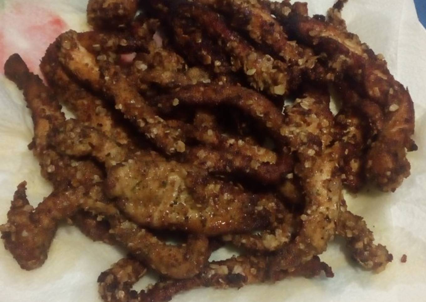 Tiras de pollo rebozado con avena y especias