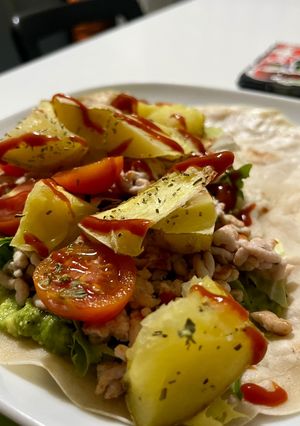 A picture of Loaded Piadina 🫓🍗🥑🍅🥗🥔.