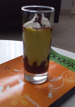 A picture of Avocado shake topped with vanilla ice cream.