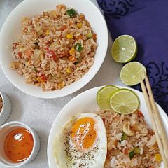 A picture of Thai style fried rice with pineapple.
