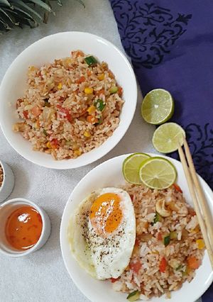 A picture of Thai style fried rice with pineapple.