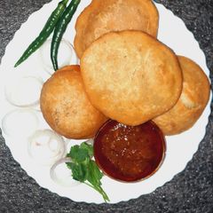 A picture of Moong Dal Kachori with whole wheat flour.