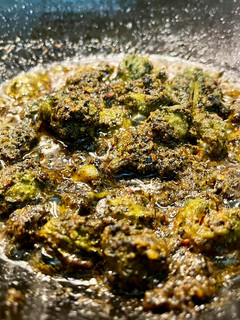 A picture of Gota Kalara Besara Bhaja (Small Bitter Gourd stuffed with Mustard paste).