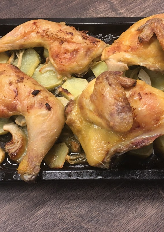 Una foto de Pollo al horno con patatas