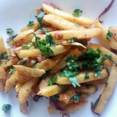 A picture of Spicy buttered chips.