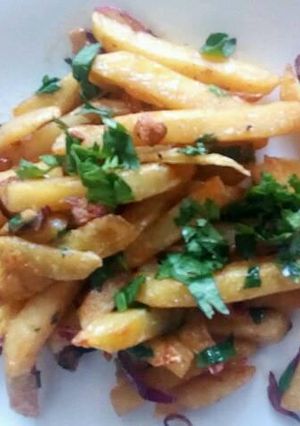 A picture of Spicy buttered chips.