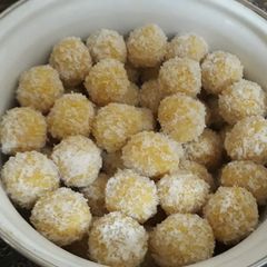 A picture of Coconut seffron laddo.