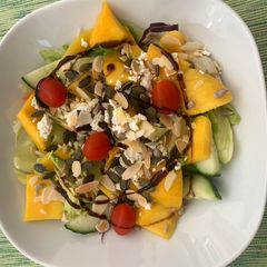 A picture of Mango, Fetaand seeds salad.