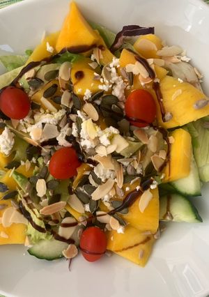 A picture of Mango, Fetaand seeds salad.