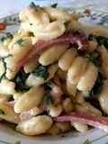 Cavatelli con crema di patate, speck e rucola