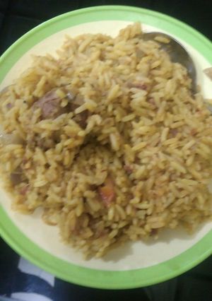 A picture of Jollof rice and meat.
