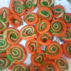 Swirl colourful masala mathri A picture of Swirl colourful masala mathri.