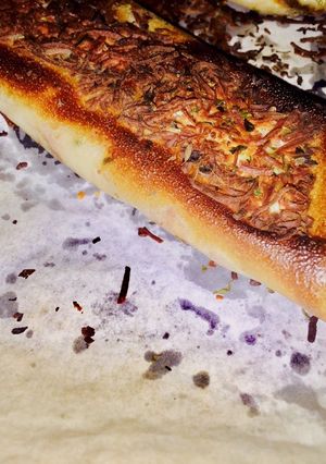 Una foto de Flautin de brick con bacon bechamel pavo y queso