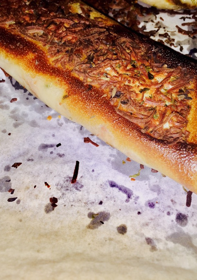 Una foto de Flautin de brick con bacon bechamel pavo y queso