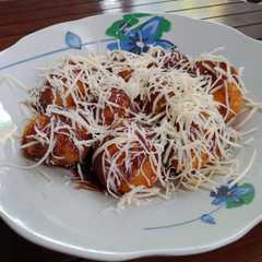 รูปของ Bola Tape Cokelat Keju
