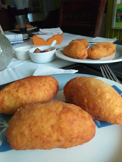 Una foto de Papas rellenas con carne y verduras