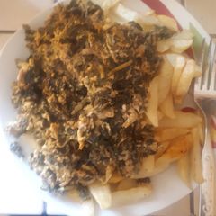 Irish potato chips with vegetable egg sauce A picture of Irish potato chips with vegetable egg sauce.