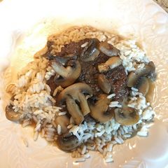 Hamburger Steak with Sautéed Mushrooms on Rice A picture of Hamburger Steak with Sautéed Mushrooms on Rice.