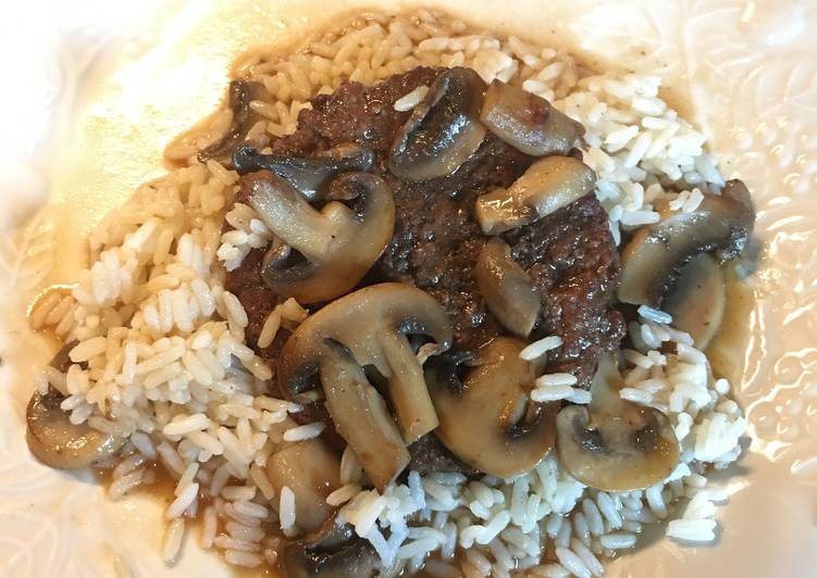 Hamburger Steak with Sautéed Mushrooms on Rice