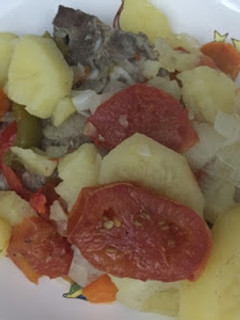 Una foto de Bifes a la criolla