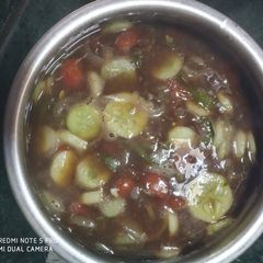 A picture of Veggies cooked in sweet and sour sauce with chicken(Thai dish).