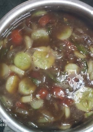 A picture of Veggies cooked in sweet and sour sauce with chicken(Thai dish).