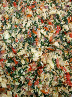 A picture of Fried egg with vegetable.