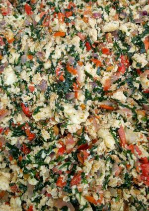 A picture of Fried egg with vegetable.