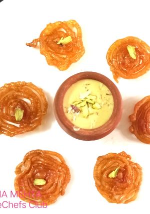 A picture of Jowar jalebi with rabdi.