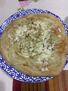 Una foto de Pizza pan de cebolla 🧅