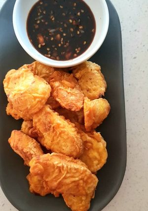 A picture of Banana Fritters with Sweet & Spicy Soy Sauce Dip.