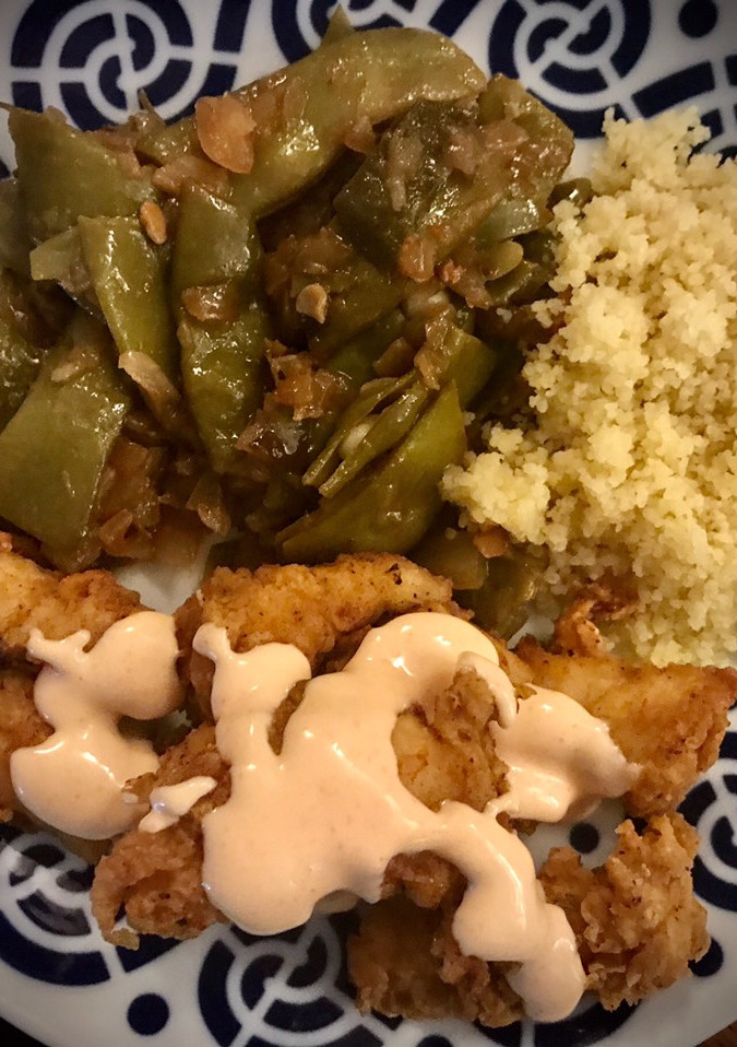 Una foto de Cous-cous con merluza estilo tunecino