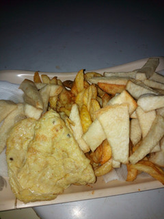 A picture of Chip,fried yam and egg.