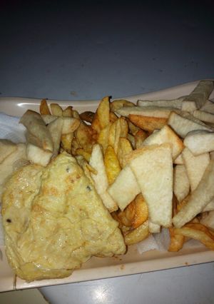 A picture of Chip,fried yam and egg.