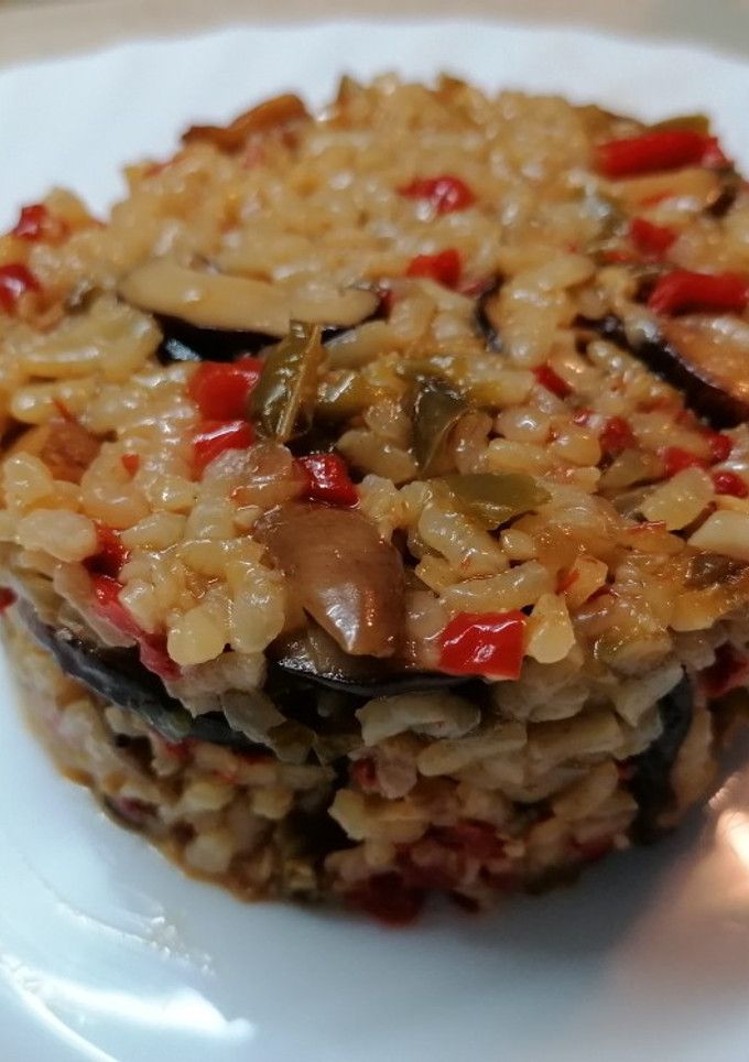 Una foto de Arroz al horno con setas y verduras