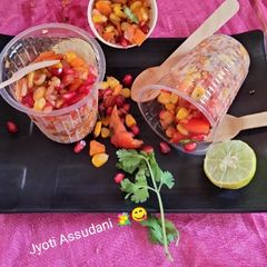 A picture of Corn 🥗 with vegetable salad.