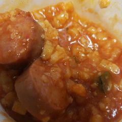 A picture of Cajun Cauliflower rice with smoked sausage.