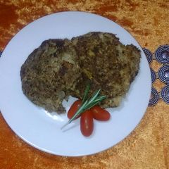 A picture of Brown bread crusted fish cakes.