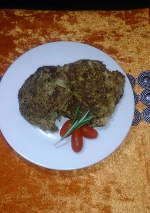 A picture of Brown bread crusted fish cakes.