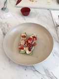 Cucumber hummus boat