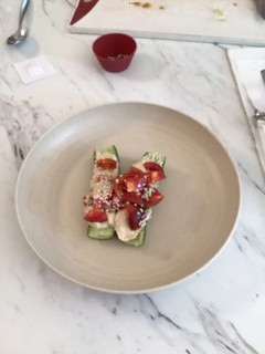 A picture of Cucumber hummus boat.