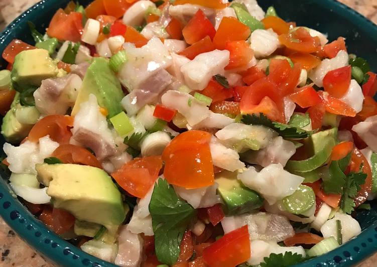 Ceviche with avocado, cherry tomatoes and spring onions