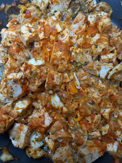 A picture of Zucchini with Smoked Tofu and Boiled Eggs in Ajvar Sauce.