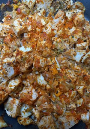A picture of Zucchini with Smoked Tofu and Boiled Eggs in Ajvar Sauce.