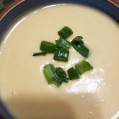 A picture of Cheesy Cauliflower and Potato Soup.