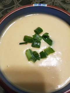 A picture of Cheesy Cauliflower and Potato Soup.