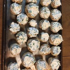 A picture of Cream cheese and spinach stuffed mushrooms.